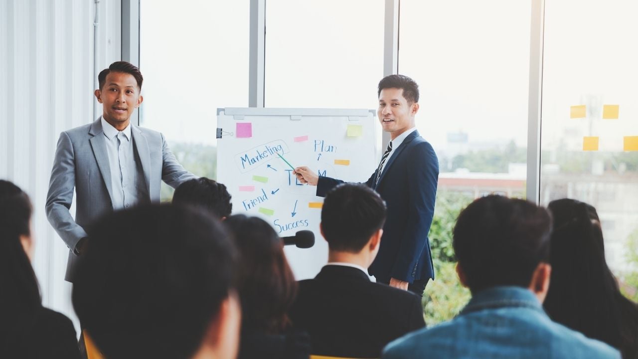 asian man instructing